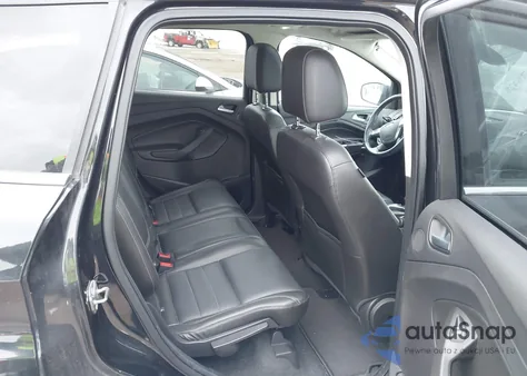 2014 Ford Escape Titanium z USA, uszkodzony, nr VIN 1FMCU9J93EUD97735